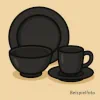 Geschirrset in schwarz als Symbolbild